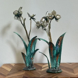 Island Elegance in Bloom: Orchid Sculpture Pair